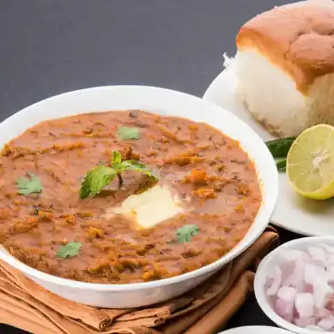 Pav bhaji — Savor the authentic taste of street food with our Pav Bhaji, a spicy at Aha Biryanis - Canton