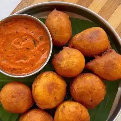 Mysore Bonda — Savor our Mysore Bonda, featuring a delightfully crisp, golden exterior at Aha Biryanis - Farmington hills, Farmington Hills