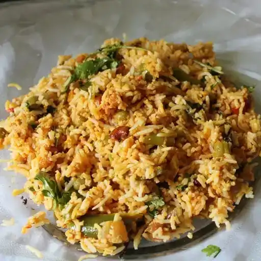 Mughlai Veg Biryani — Experience the symphony of flavors in our Mutual Veg Biryani at Aha Biryanis - Farmington hills, Farmington Hills