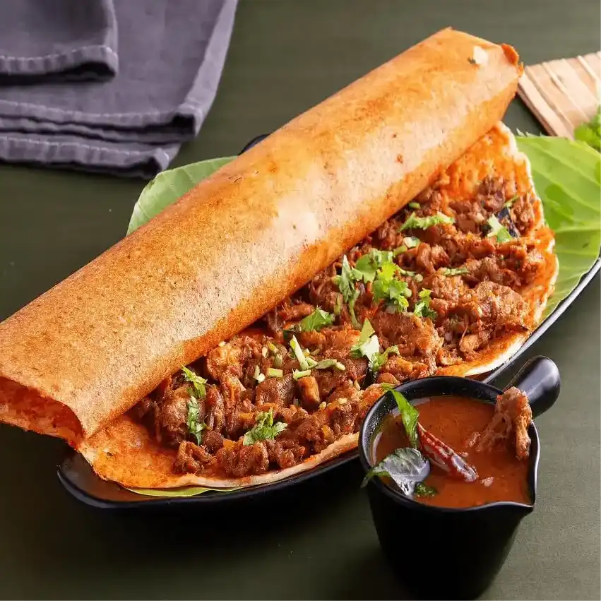 Mutton keema dosa — Experience the perfect union of a golden-crisp dosa and succulent at Aha Biryanis - Farmington hills, Farmington Hills