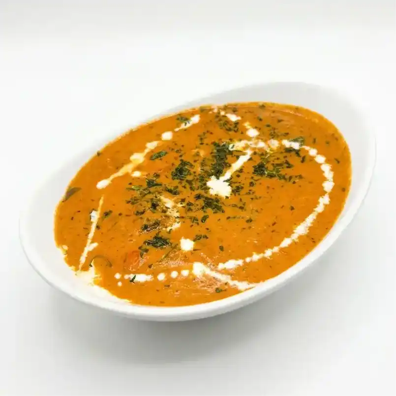 Chicken Tikka Masala — Savor tender, marinated chicken simmered in a creamy, spiced tomato at Konaseema Cuisine, North Brunswick
