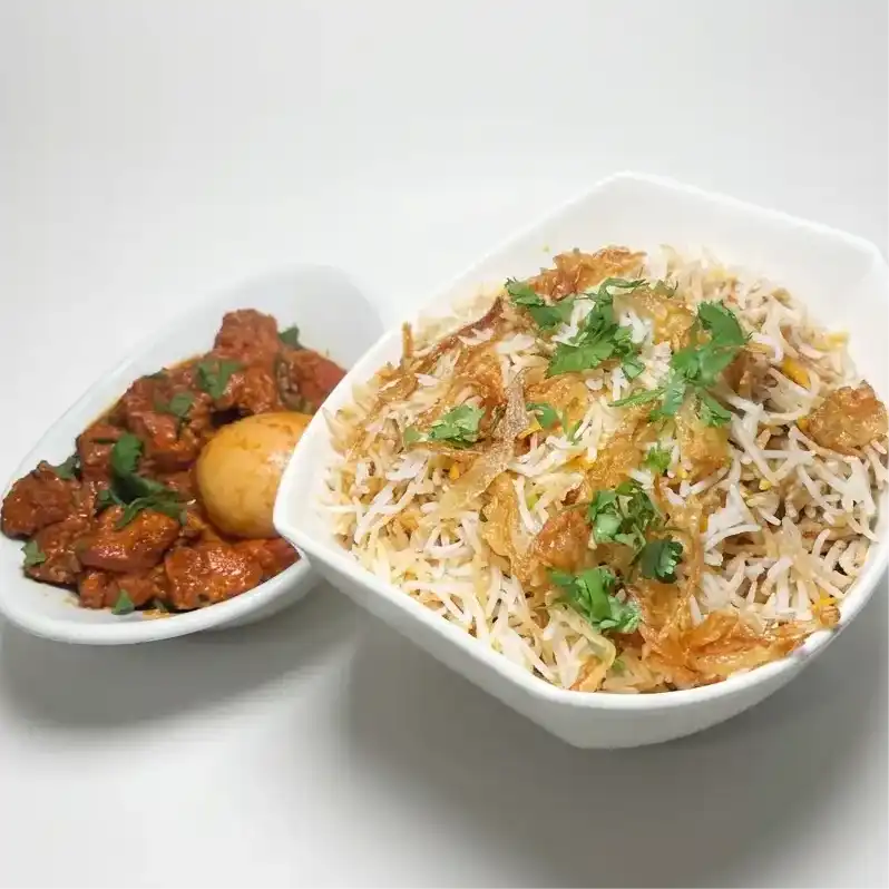 Bezawada Chicken Biryani — Savor the authentic taste of Bezawada Chicken Biryani, featuring tender at Konaseema Cuisine, North Brunswick