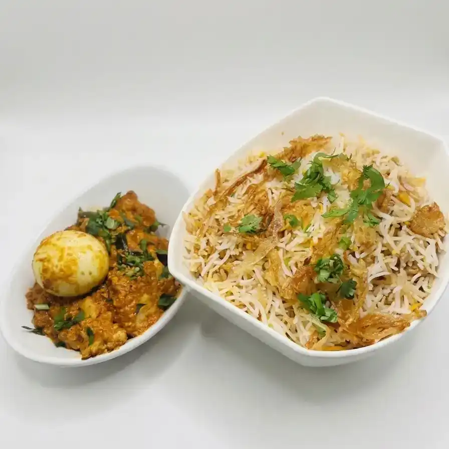 Bezawada Fish Biryani — Savor the authentic taste of Bezawada Chicken Biryani, featuring tender at Konaseema Cuisine, North Brunswick