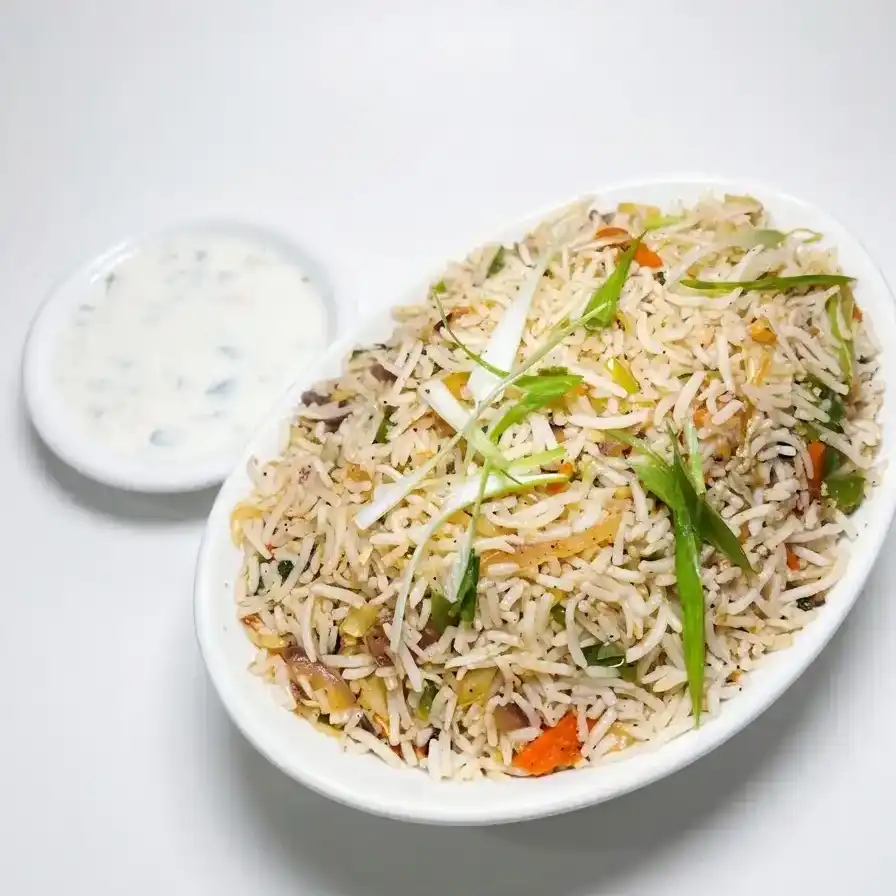 Veg Fried Rice — Fragrant, wok-tossed rice mixed with fresh seasonal vegetables and mild at Konaseema Cuisine, North Brunswick