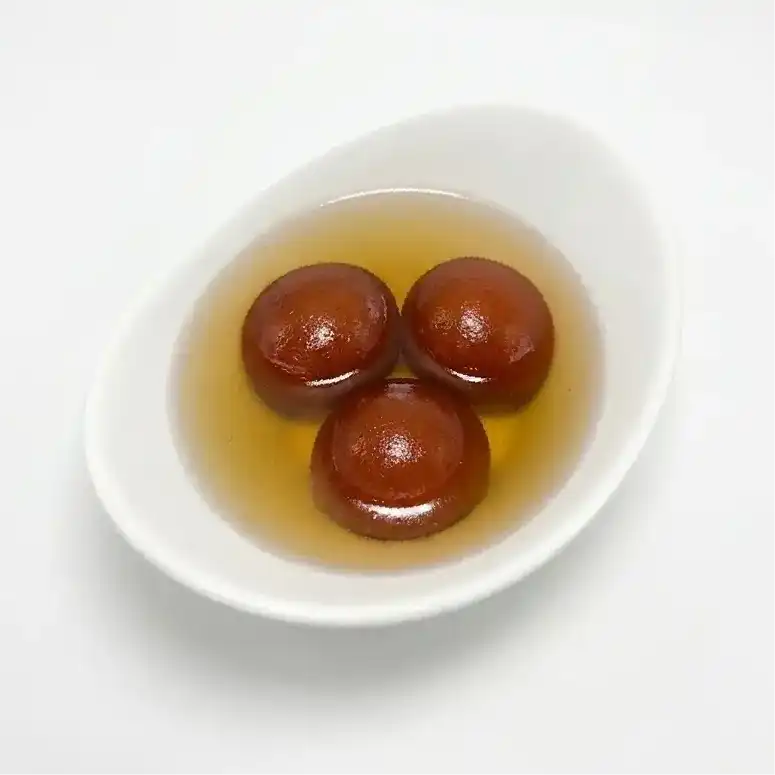 Gulab Jamun - 3 Pcs — Indulge in three melt-in-your-mouth Gulab Jamuns, classic Indian sweet at Konaseema Cuisine, North Brunswick