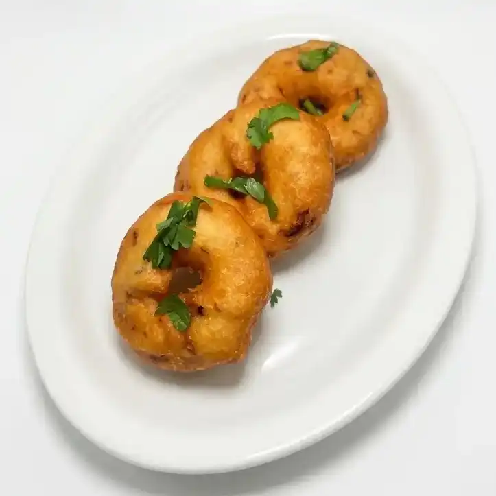 Medu Wada - 3 pcs — Deep fried Lentil donuts served with Peanut, Tomato chutneys and Sambar at Konaseema Cuisine, North Brunswick