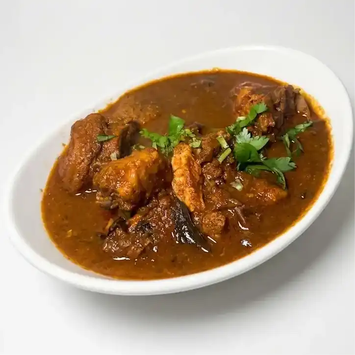 Natukodi Pulusu — Savor the rich and spicy flavors of Natukodi Pulusu, a traditional at Konaseema Cuisine, North Brunswick