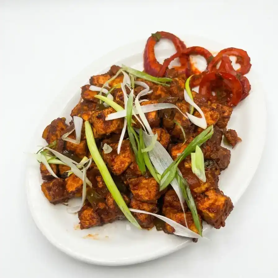 Chilli Paneer — Savor the tangy sensation of our Chilli Paneer at Konaseema Cuisine, North Brunswick