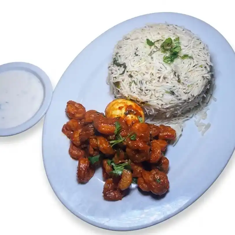Ravulapalem Shrimp Pulao — Fragrant basmati rice topped with spicy Andhra-style Shrimp fry pieces at Konaseema Cuisine, North Brunswick