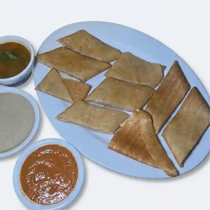 Cheese Dosa — Savor the fusion of South Indian tradition with a twist; crispy dosa at Konaseema Cuisine, North Brunswick