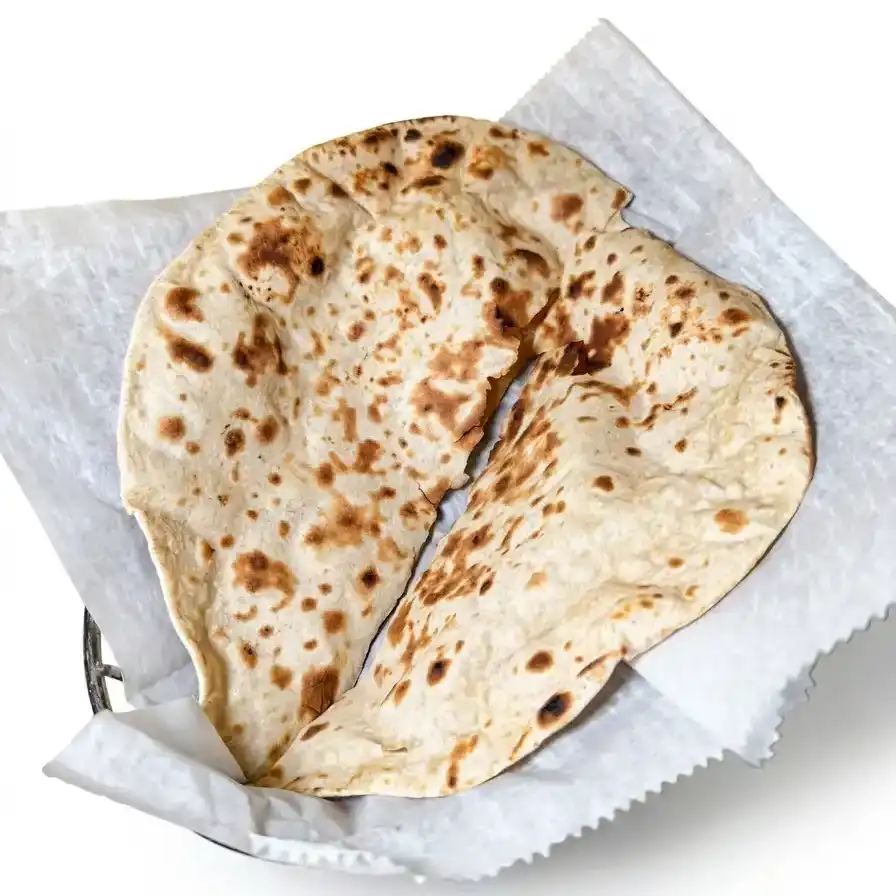 Chapathi — raditional Indian soft bread made with whole wheat flour at Konaseema Cuisine, North Brunswick