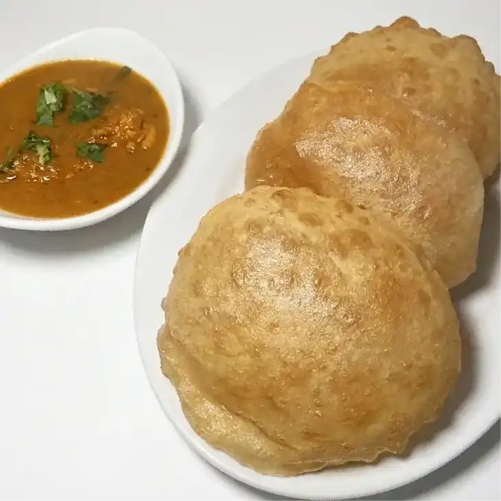 Poori 3Pcs - Goat Curry — Soft unleavened Indian bread made with wheat flour and deep fried at Konaseema Cuisine, North Brunswick