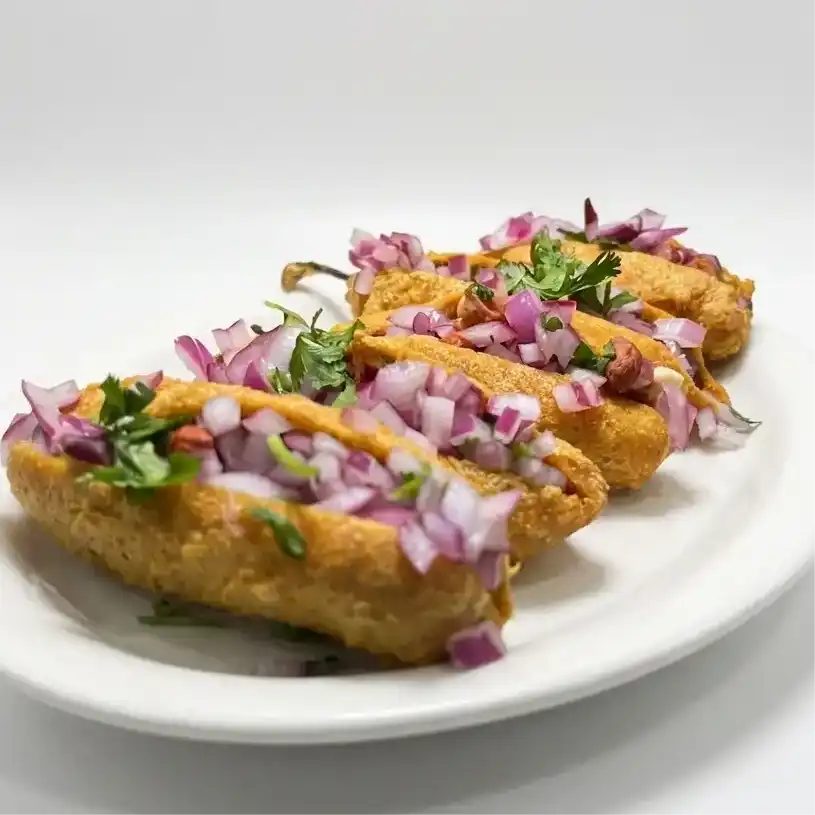 Guntur Mirchi Bajji — Savor the authentic taste of South India with Guntur Mirchi Bajji - at Konaseema Rocky Hill, Rocky Hill