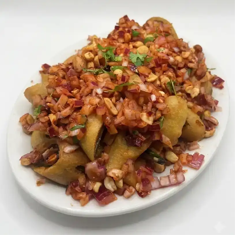 Cut Mirchi — Spice up your taste buds with Cut Mirchi, a popular Indian snack made at Konaseema Rocky Hill, Rocky Hill