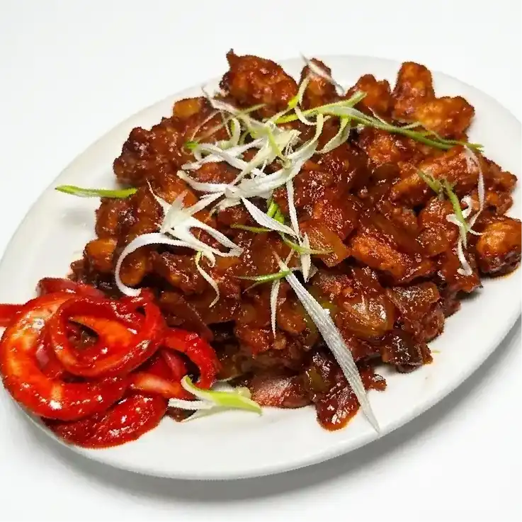 Chilli Baby Corn — Savor the bold flavors of our Chilli Baby Corn, a spicy, crunchy at Konaseema Rocky Hill, Rocky Hill