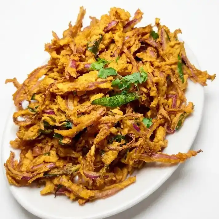 Onion Pakora — Crispy, hot, and flavorful fried fritters made of finely chopped at Konaseema Rocky Hill, Rocky Hill