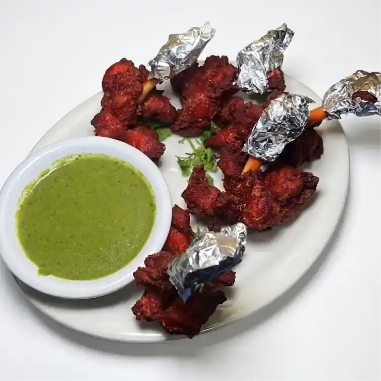 Chicken Lollipop — is a scrumptious treat made from winglets of chicken, marinated in rich at Konaseema Rocky Hill, Rocky Hill
