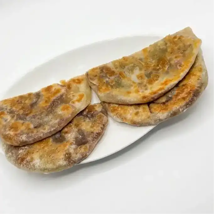 Bobbatlu - 2 pieces — Savor the sweetness of Bobbatlu, a traditional Indian dessert at Konaseema Rocky Hill, Rocky Hill