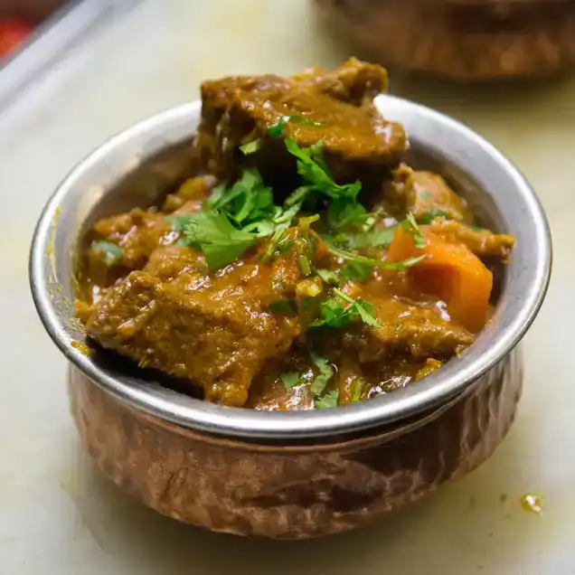 Goat Curry ( Bone-in )  at Tulsi